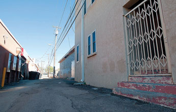 The city hopes to receive $400,000 from the state Legislature for the Coal Avenue alley reconstruction, Phase I. The money will cover reconstruction of the alley between Aztec and Coal avenues, running from First Street to Second Street. The project is part of the city's infrastructure Capital improement Plan. This photo shows the section of the alley behind City Hall. © 2011 Gallup Independent / Adron Gardner 